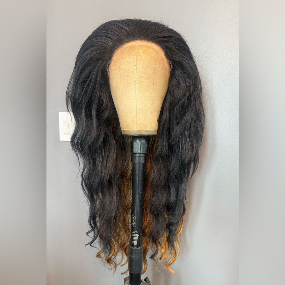 Synthetic 26 inch black and orange styled drag wig. Worn once